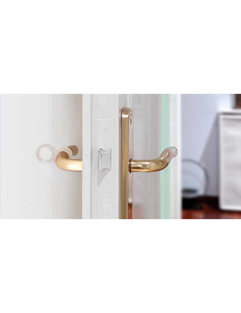 Pack 2 retenedores de puerta para colocación en manilla de plástico flexible transparente. mod. 8. rei