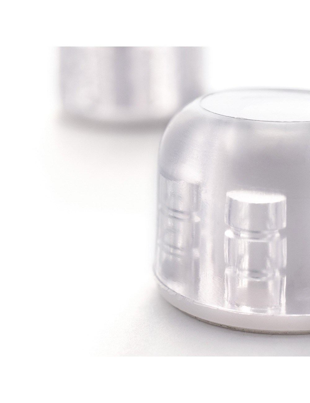 Tope de puerta adhesivo top transparente fabricado en plástico. rei