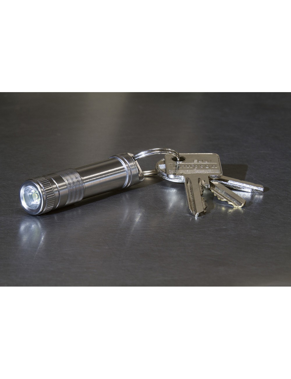 Micro linterna llavero aaa