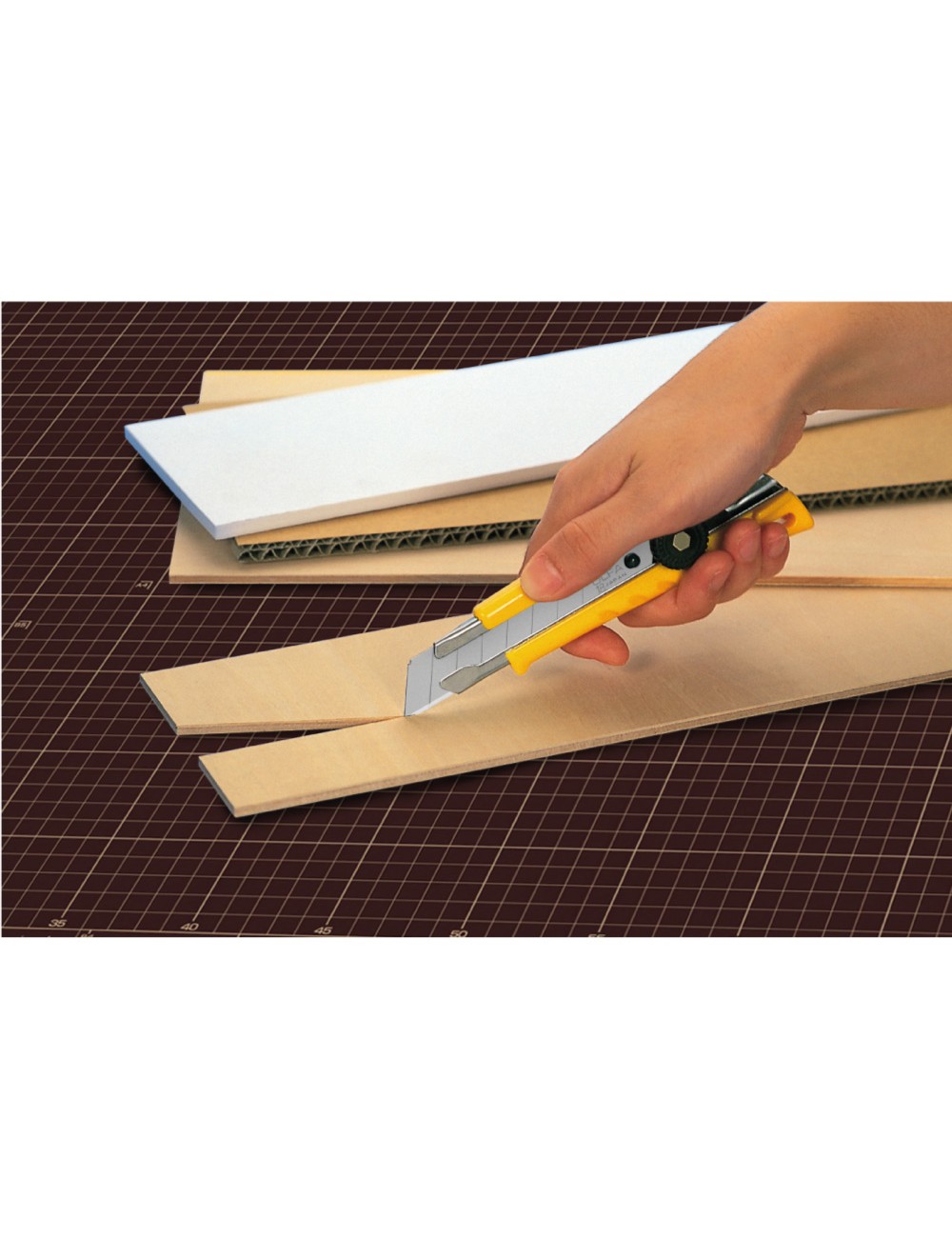 Cúter l-1 con bloqueo manual y cuchilla de 18 mm